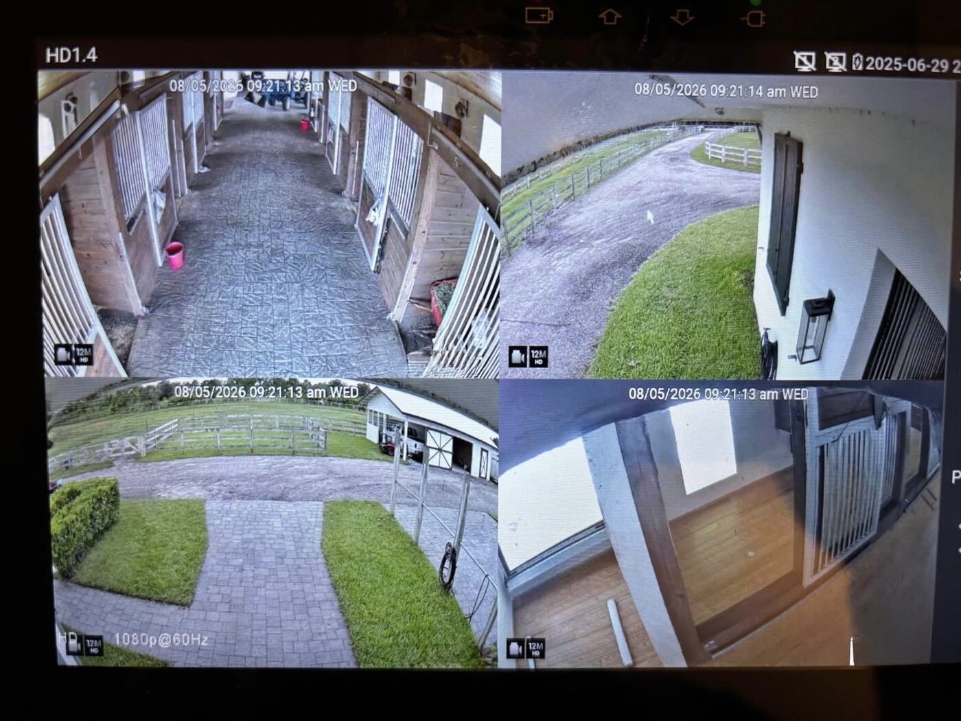 Stable hallway and paddock views